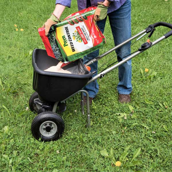 Filling spreader with Preen Weed Control