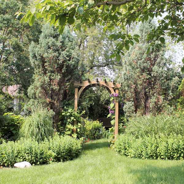 Grasses and summer annuals take center stage in this same garden in summer. George Weigel